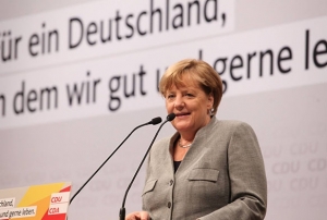 Merkel seim almalarna balad