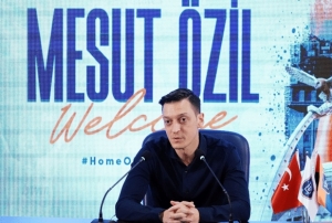 Mesut zil, Baakehire resmi imzay att